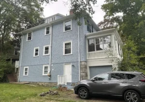 Exterior house painting project with professional craftsmanship